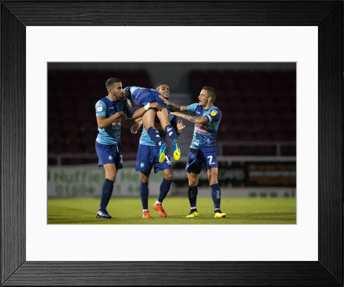 Framed Print : The team celebrate Scott Kashkets goal