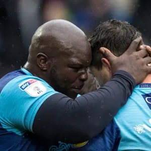 Adebayo Akinfenwa and Joe Jacobson Adebayo Akinfenwa and Joe Jacobson