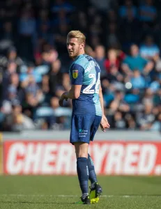 Determined Defender: Jason McCarthy's Intense Battle Against Southend United, September 29, 2018