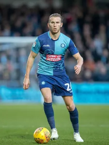 26. Jason McCarthy Prints: Determined Defender: McCarthy's Intense Showdown Against Barnsley (08/12/18)