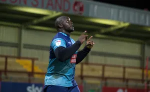 Celebration Photos 2018/19 Prints: Powerful Showdown: Adebayo Akinfenwa's Unforgettable Performance for Wycombe Wanderers Against Fleetwood